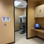 Imaging room at High Desert Oral & Facial Surgery with dental equipment and a computer workstation.